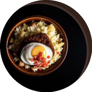 Silpancho con arroz, papa y huevo frito
